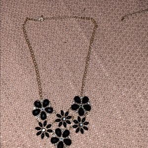 black and silver necklace, gold chain